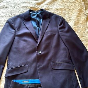 Kenneth Cole Suit young men’s. Pants 32” waist, inseam 28”. Sleeve 24” Back 18”
